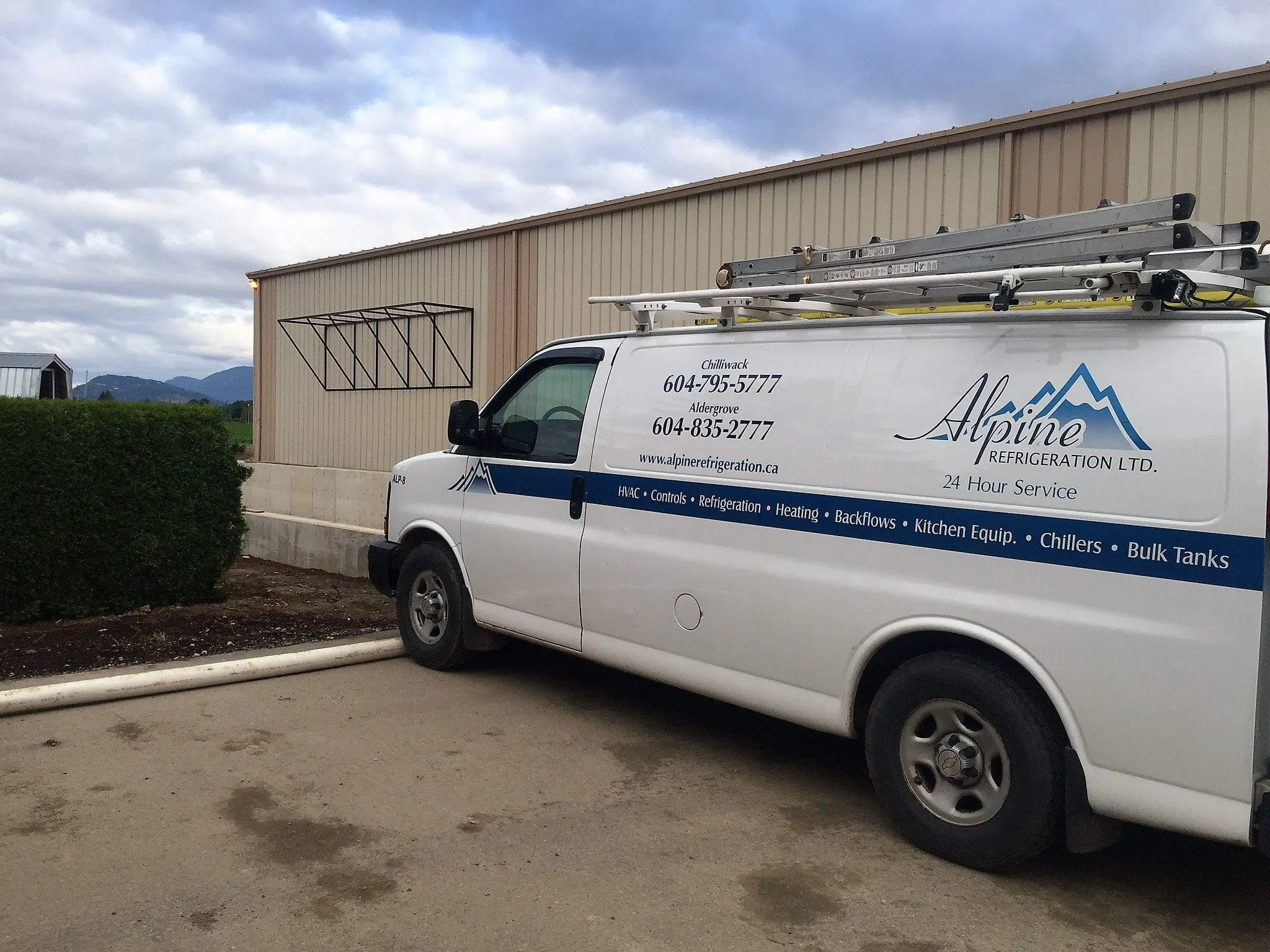 Alpine Refrigeration service van at warehouse facility in Chilliwack BC