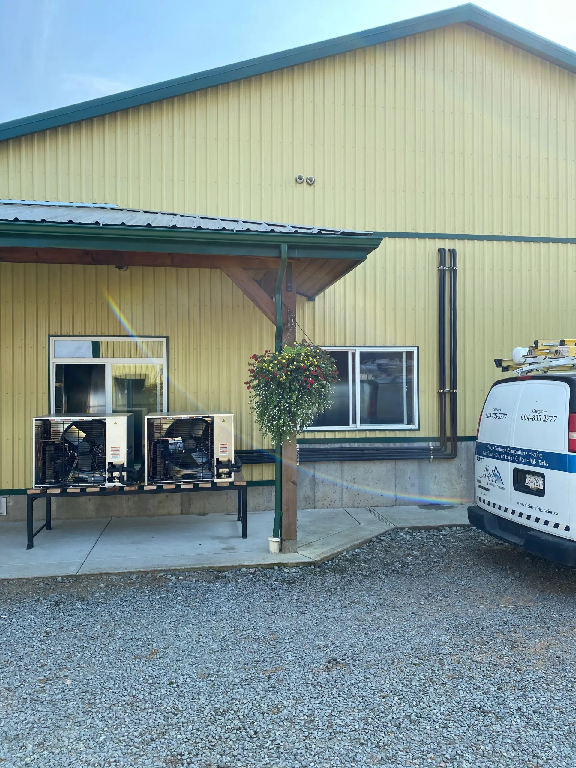 Alpine Refrigeration service vehicle with condensing units at poultry barn