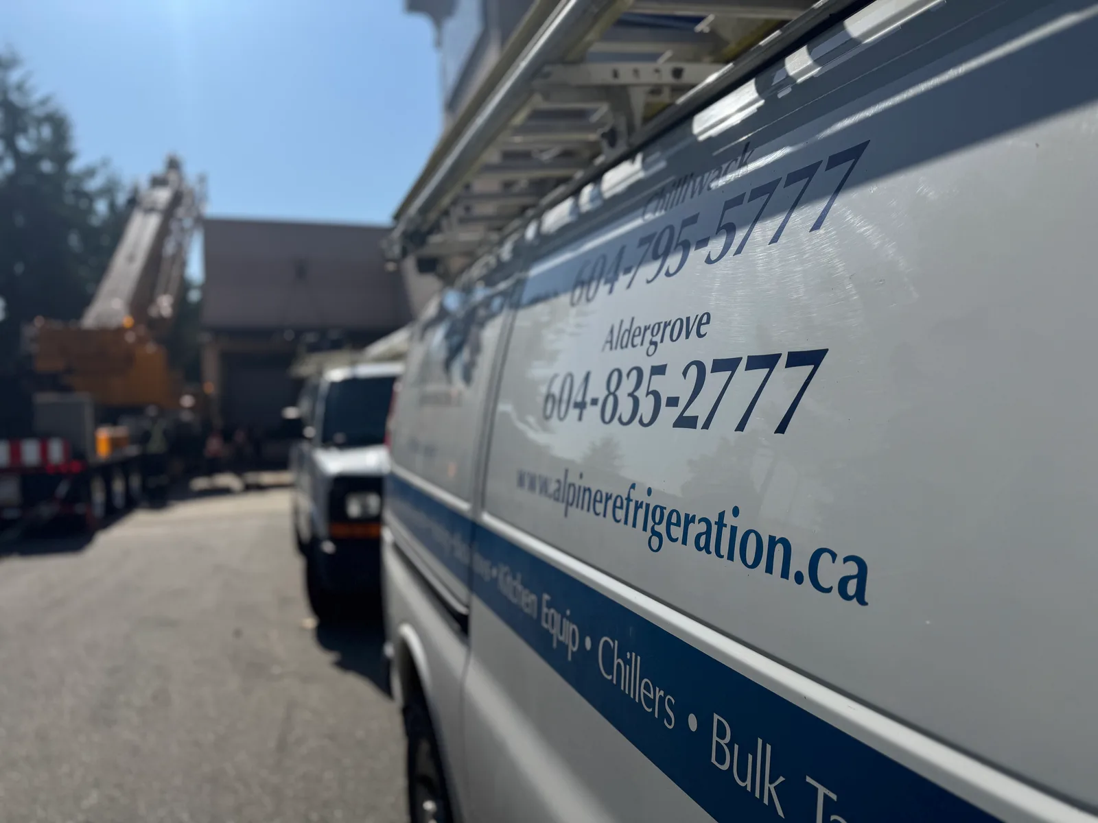 Alpine Refrigeration service van with Chilliwack 604-795-5777 and Aldergrove 604-835-2777 dispatch numbers on the side