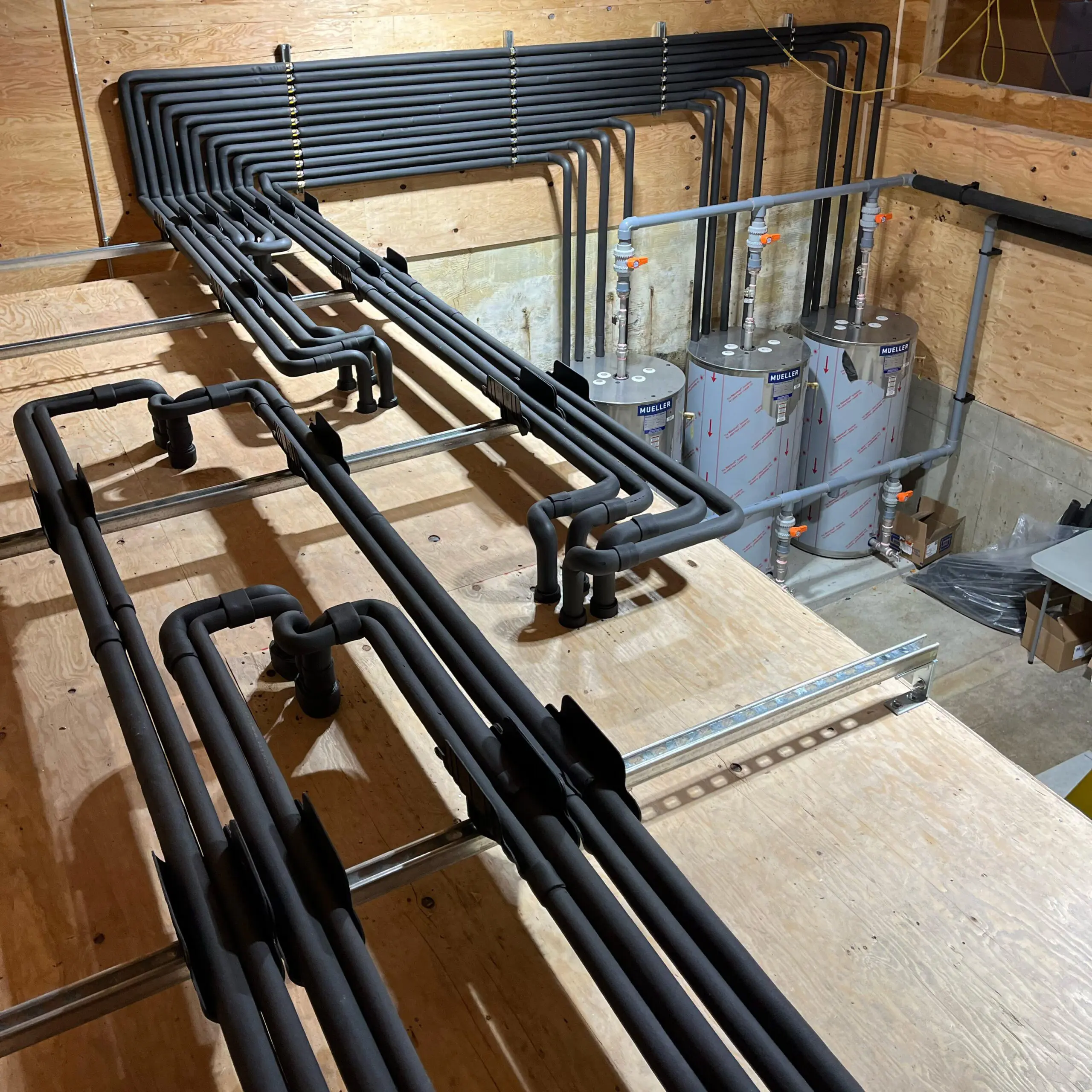 Custom piping and control system installed at Gracemar Farms dairy retrofit to improve efficiency and system reliability