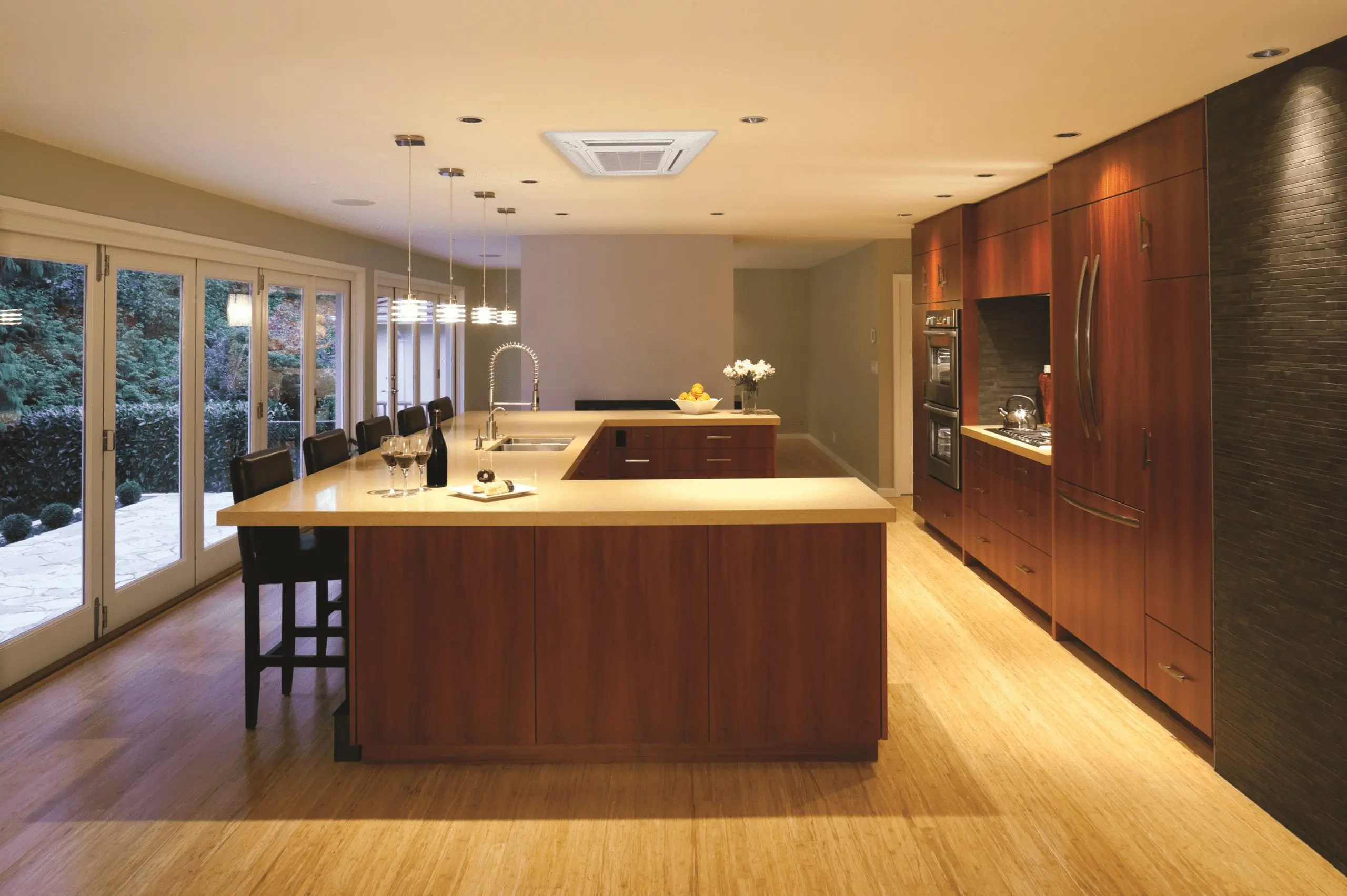 Modern kitchen with Alpine Refrigeration residential heating and cooling system