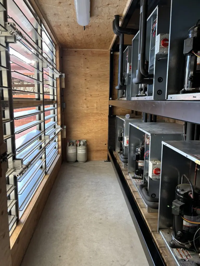 Gracemar Farms dairy chiller retrofit with clean-room layout and new equipment racks for heat recovery in Chilliwack, BC
